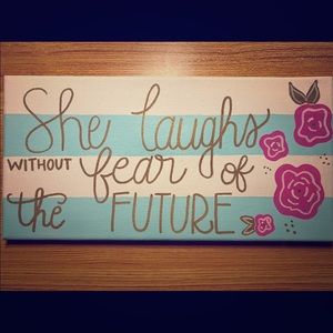 She Laughs Without Fear Of The Future Sign